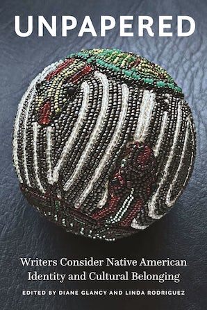 The cover of the Unpapered book featuring a beaded ball.